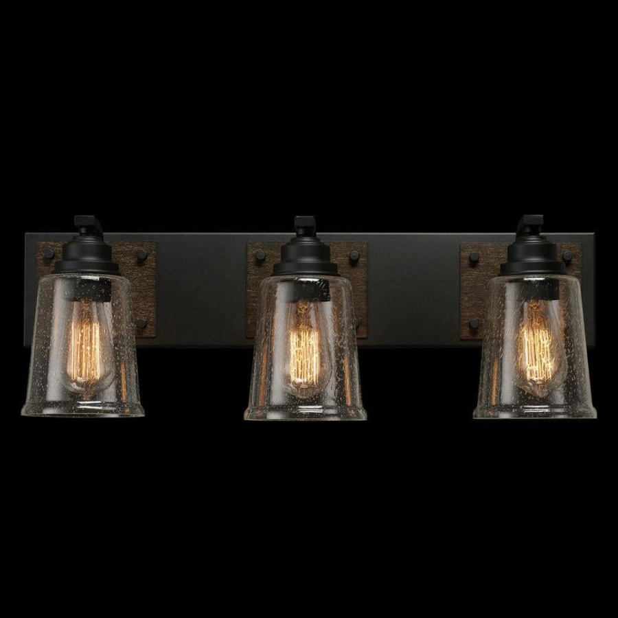 Vanity Lighting * | Warsaw 24 In. 3-Light Matte Black Vanity Light With Faux Wood Accents And Clear Seeded Glass Shades By Globe Electric